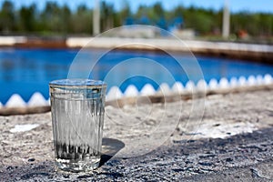 Clear glass filled with purified water photo
