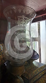 Clear glass lamp with wishing carved photo