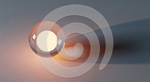 A clear glass sphere rests on a smooth surface, capturing and refracting light within,