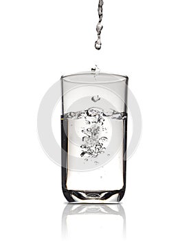 Clear glass with water and air bubbles inside