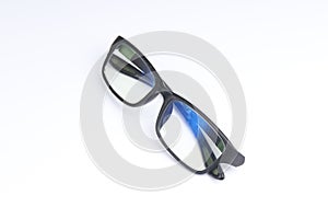 Clear glasses with black frame on isolated white background