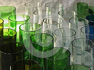 Clear and green glasses for different kinds of drinks