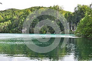 Clear Green Lake with Waterfalls