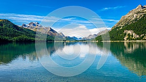 Clear morning at Lake Silvaplana Upper Engadine Valley, GraubÃ¼nden, Switzerland