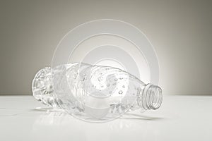 Clear plastic water bottle with droplets