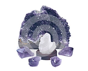 Clear quartz cluster surrounded by amethyst purple druse geode and amethyst points