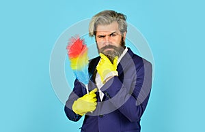 Clear reputation. Hipster hold cleaning tool. Cleaning concept. Office duster. Man use pp duster. Dust allergy