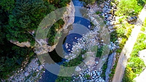 Clear river with rocks in the mountain.