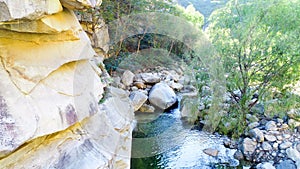 Clear river with rocks in the mountain.