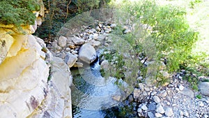 Clear river with rocks in the mountain.