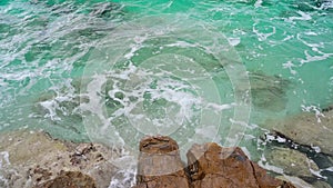 Clear sea water on the beach in Kas, Turkey. Pebble beach, Azure sea