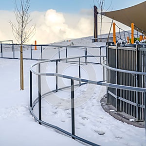 Clear Square Park in Eagle Mountain Utah against blue sky with clouds in winter