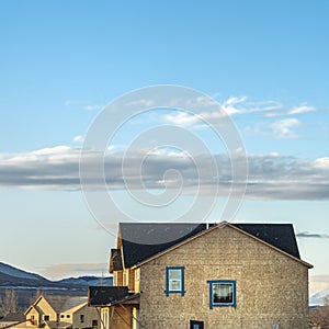 Clear Square View of new houses under construction under stunning blue sky with clouds