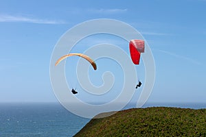 Clear summer afternoon Mussel Rock California Hand Gliders enjoying the wind