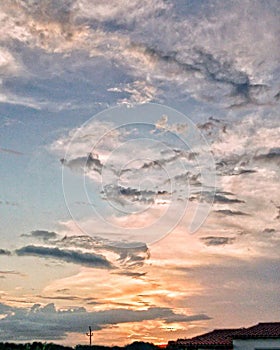 Clear sunsetwith clouds vertical brush strokes