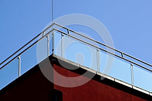 Clear tempered glass balcony balustrade and exterior facade detail