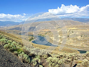 Clear Thompson River winds its Way through the Dry Mountains near Ashcroft, British Columbia, Canada