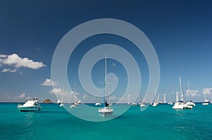 Clear torquoise water, yachts, boats photo