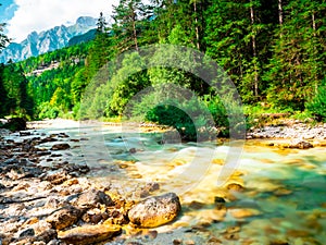 Clear torrent of water with the mountains