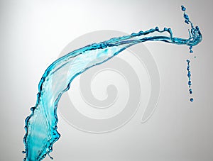 Clear, transparent blue water splash on white background