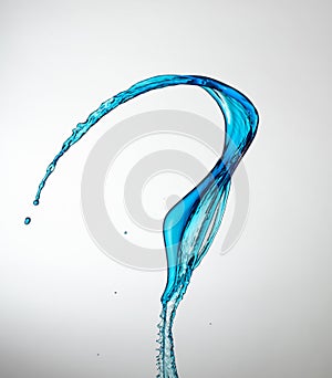 Clear, transparent blue water splash on white background