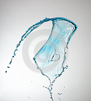 Clear, transparent blue water splash on white background