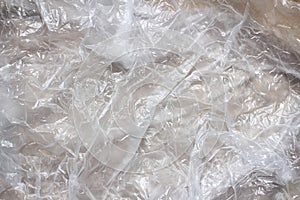 Clear transparent plastic bag texture background. Waste recycling concept. Crumpled polyethylene and cellophane.