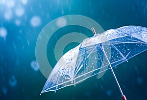 Clear umbrella caught in rain, droplets striking and rolling off. Moody, dark atmosphere in background, highlighting rain texture