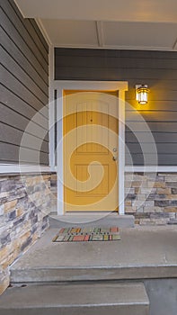 Clear Vertical Entryway of a home with stairs going up to the front porch and door