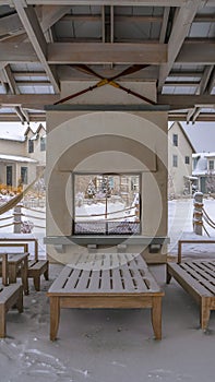 Clear Vertical Seating on the snowy patio of a clubhouse in Utah