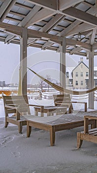 Clear Vertical Snowy patio of a clubhouse in Daybreak Utah