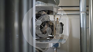 A clear view of the pump mechanism inside an evaporative cooler responsible for circulating water through the system photo