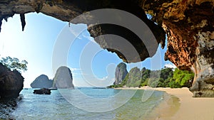 Clear water, blue sky at cave beach, Krabi