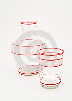 Clear Water Jug and Glass with Red Stripes.