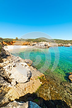Clear water and rocks in Alghero shore