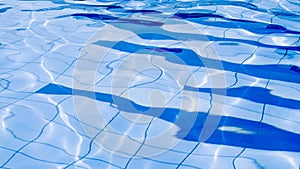 Clear water surface. Blue wave texture, pool water background. Abstract summer sea pattern.
