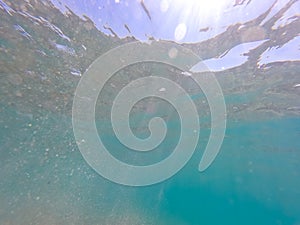 Clear water. underwater background with sandy sea bottom. Beautiful texture of the sea and ocean water