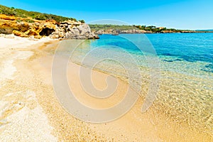 Clear water and white sand in Alghero shore