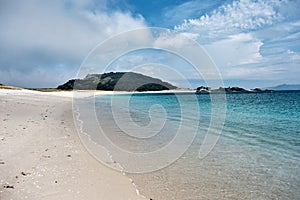 Clear water and white sand beach in Cies Islands photo