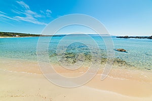 Clear water and white sand in Le Bombarde beach
