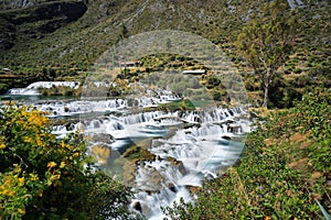 Clear waters of CaÃÂ±ete river in Huancaya village, Peru photo