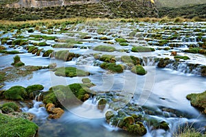 Clear waters of CaÃÂ±ete river near Vilca villag, Peru photo