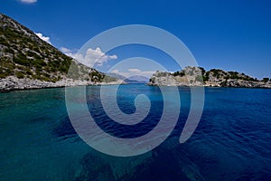 The clear waters of The Mediterranean from a bay in Greece