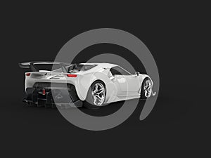 Clear white modern luxury super car on dark background - back view