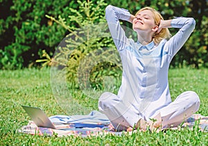 Clear your mind. Girl meditate on rug green grass meadow nature background. Find minute to relax. Woman relaxing