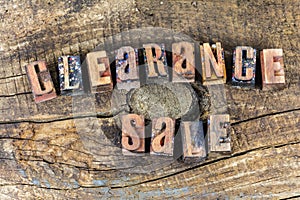 Clearance sale business sign letterpress