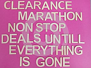 Clearance sale sign on a pink background