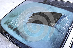 Cleared the frost on the windshield in the cold, front and rear blurring the background