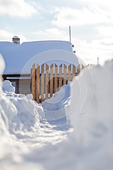 Clearing snow after a big snowfall in winter.