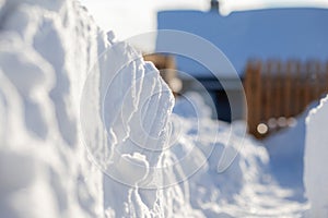 Clearing snow after a big snowfall in winter.